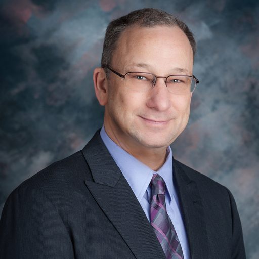 Troy Patterson in a suit and tie.